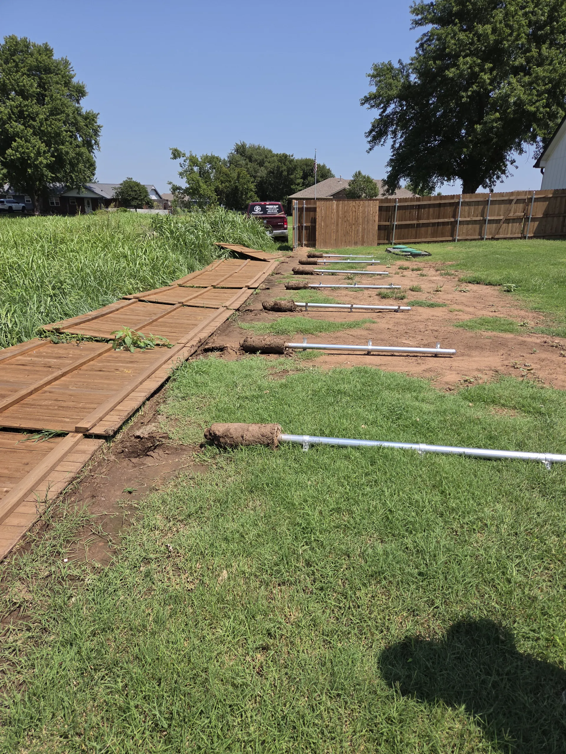 Storm Damaged Fence — Before